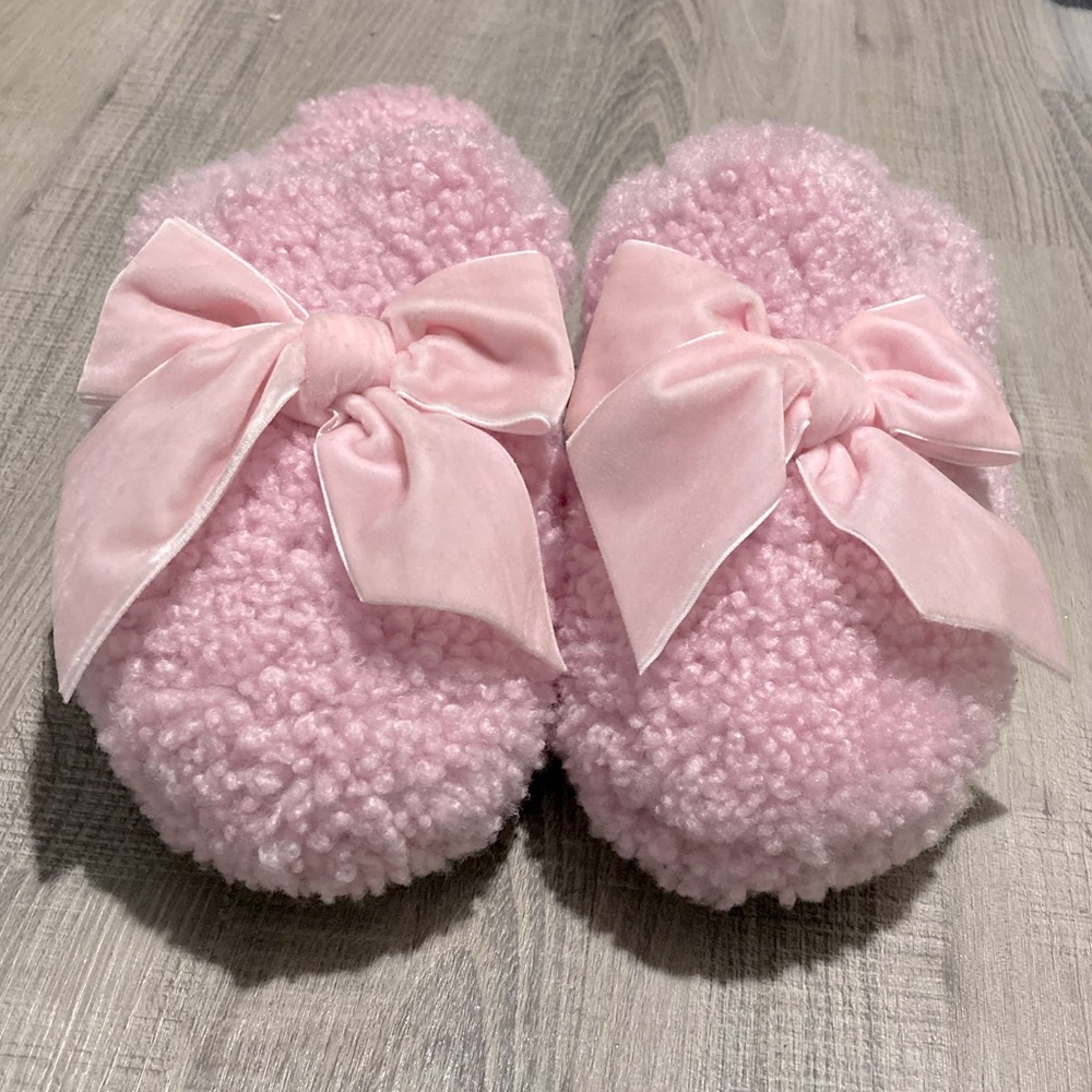 Ugg Addison velvet bow slippers. Curly pink sheepskin; has a 1.5 inch platform.